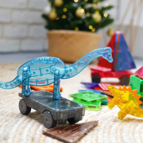 Dino World XL Magnet-Set mit Dinosauriern und Bäumen.