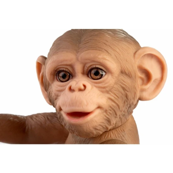 Niedliches handgefertigtes Affenbaby mit Vinylkörper, realistischen Details und beweglichen Gelenken, 32 cm.
