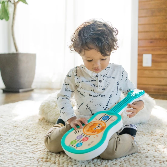 Musikspielzeug Holz-Ukulele Magic Touch HAPE 6m+ Baby Einstein 12609-6