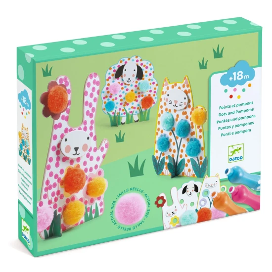 Punkte und Pompons Im Gras