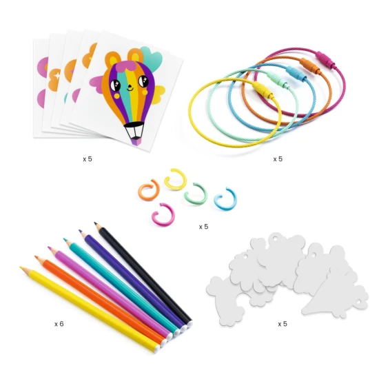 Ein kleines Set aus magischem Künstlerkunststoff zur Herstellung von 5 Schlüsselanhängern mit farbenfrohen, fröhlichen Kawaii-Motiven.