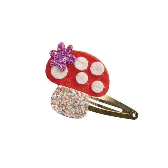 Set zum Basteln von floralen Haarspangen mit Gartenmotiven, ideal für Kinder.