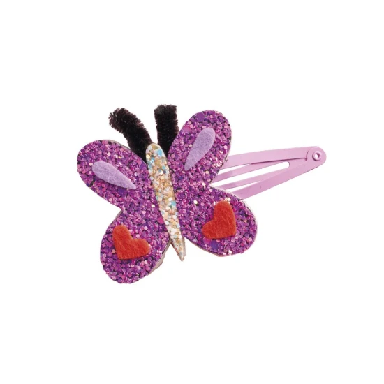 Set zum Basteln von floralen Haarspangen mit Gartenmotiven, ideal für Kinder.