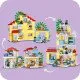 LEGO DUPLO Familienhaus 3 in 1: Ein dreistöckiges Haus, eine Garage mit Auto und ein Garten voller Pflanzen.