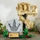 LEGO® Jurassic World T-Rex-Schädel- und Fossilien-Spielset für Kinder, mit einem Ständer mit Informationsschild, aufklappbarem Maul und verstecktem „Bernstein“-Stück.