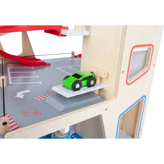 Dreistöckige Garage mit Magnetelementen für kleine Rennfahrer.