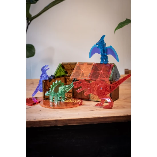 Magnetisches Dino-Bauset mit Dinosauriern und bunten Teilen.