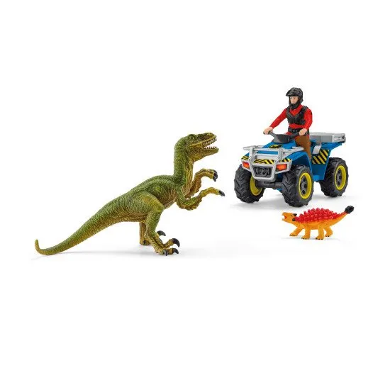 Flynn rettet auf einem Quad den Ankylosaurus Kyle vor dem gefährlichen Velociraptor.