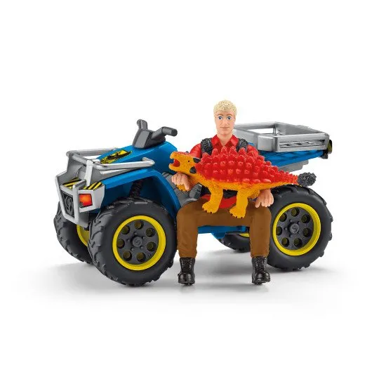 Flynn rettet auf einem Quad den Ankylosaurus Kyle vor dem gefährlichen Velociraptor.