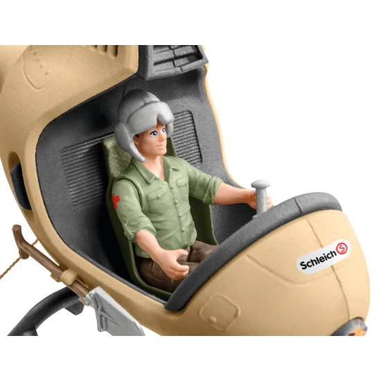 Ein Ranger mit einem Hubschrauber rettet ein Nilpferdbaby vor einem Löwen