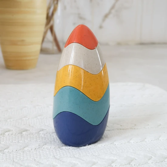 Eierstapelturm, ein didaktisches Spielzeug zur Entwicklung der Feinmotorik