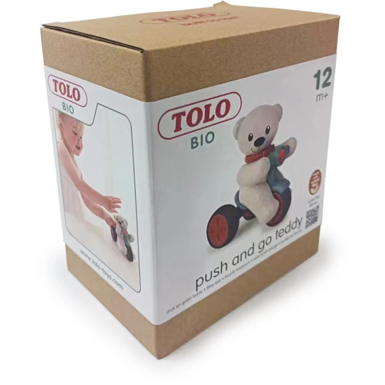 Tolo Medvedík auf einem Dreirad, drücken Sie den Kopf, um sich in Bewegung zu setzen