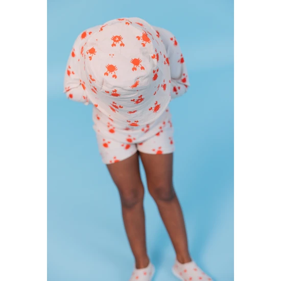 Wendehut für Kinder mit LSF 50+ – Krabbenmuster auf der einen Seite, einfarbiges Design auf der anderen. Breite Krempe für Sonnenschutz.