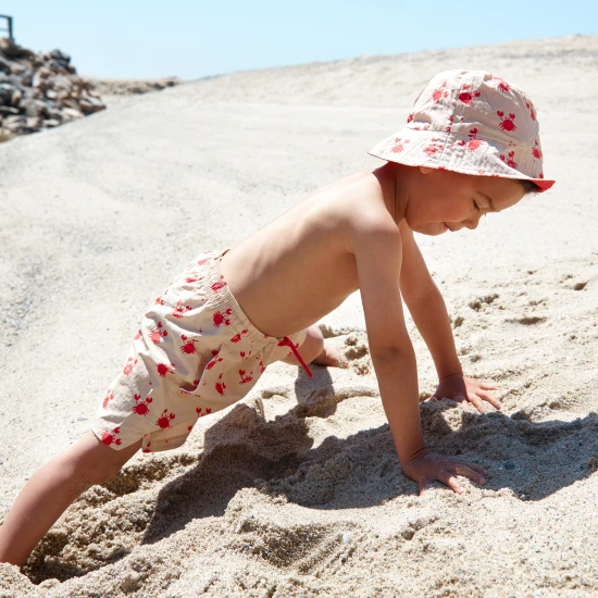 Wendehut für Kinder mit LSF 50+ – Krabbenmuster auf der einen Seite, einfarbiges Design auf der anderen. Breite Krempe für Sonnenschutz.