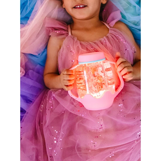Glo Pals Sensory Bottle Bubble Gum: ein leuchtendes Spielzeug für Kinder mit rosa Design.