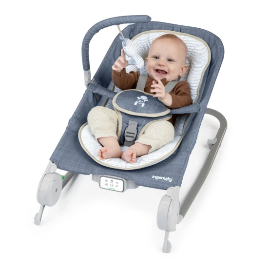 Vibrierende Massagewippe mit Melodie Happy Belly™ Rock-to-Bounce Chambray 0M+ bis 9 kg Vibrierende Massagewippe mit Melodie Happy Belly™ Rock-to-Bounce Chambray 0M+ bis 9 kg Ingenuity 16854-2