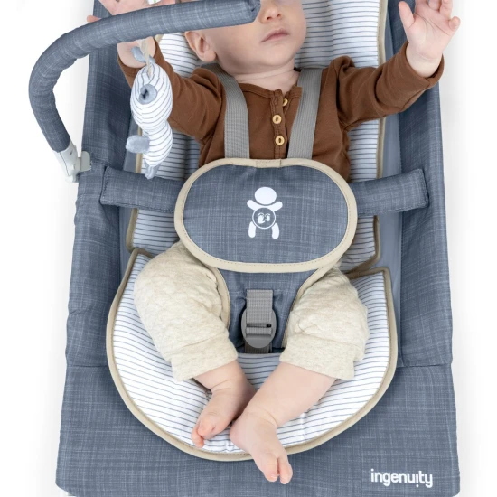 Vibrierende Massagewippe mit Melodie Happy Belly™ Rock-to-Bounce Chambray 0M+ bis 9 kg Vibrierende Massagewippe mit Melodie Happy Belly™ Rock-to-Bounce Chambray 0M+ bis 9 kg Ingenuity 16854-2