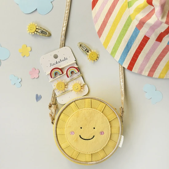 Gummibänder mit funkelndem Regenbogenmotiv. Sie sind die perfekte Möglichkeit, Ihrem Tag ein wenig Glanz zu verleihen!