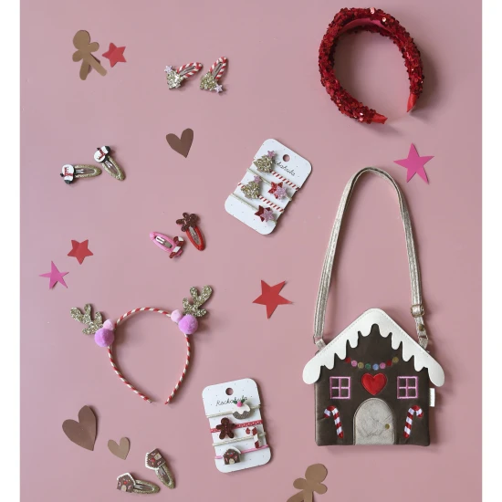 Haarspangen mit Weihnachtsmotiv und Schneemann-Design.