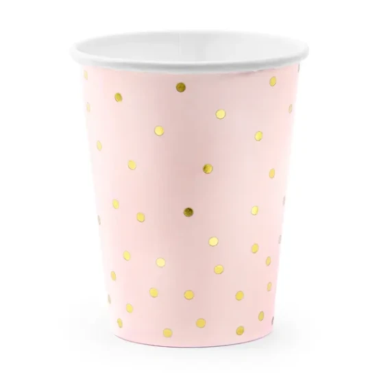 Gläser, die jede Party aufheitern. Rosa Pappbecher sind mit goldenen Punkten verziert.