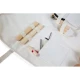 Childhome  – Set mit 8 Kinder-Musikinstrumenten mit Organizer